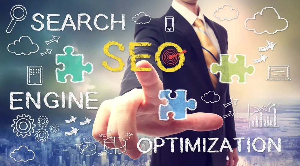 Search engine optimization concept with a businessman and puzzle pieces
