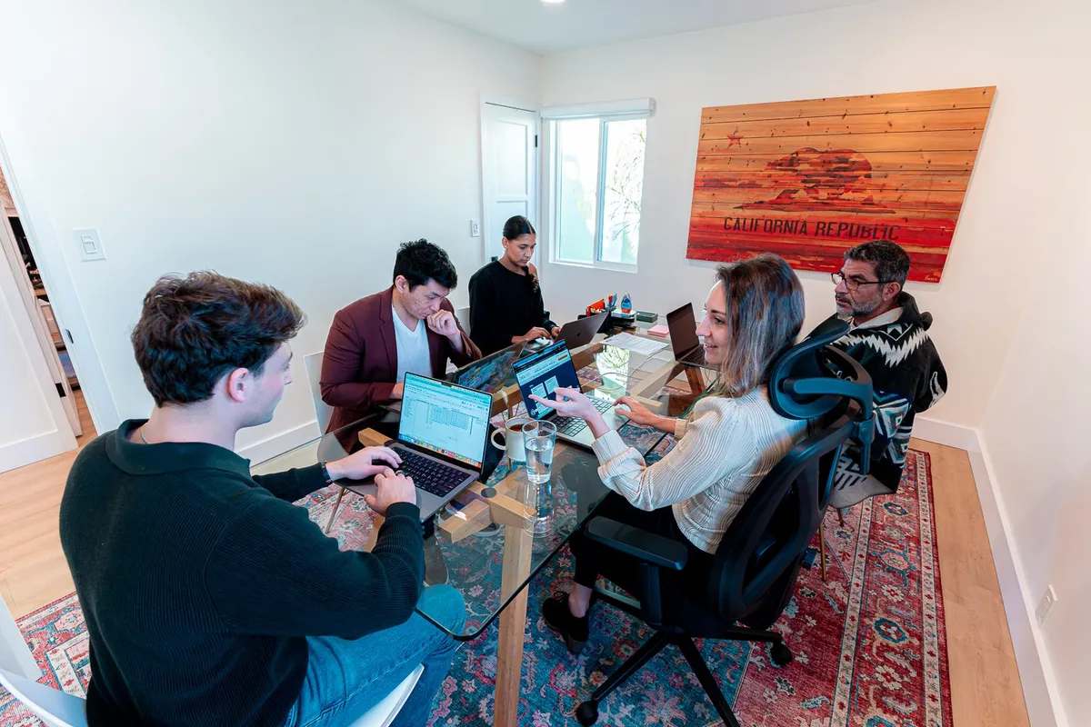 The Matador team working together around a conference table