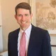 Reid Peacock, Esq.